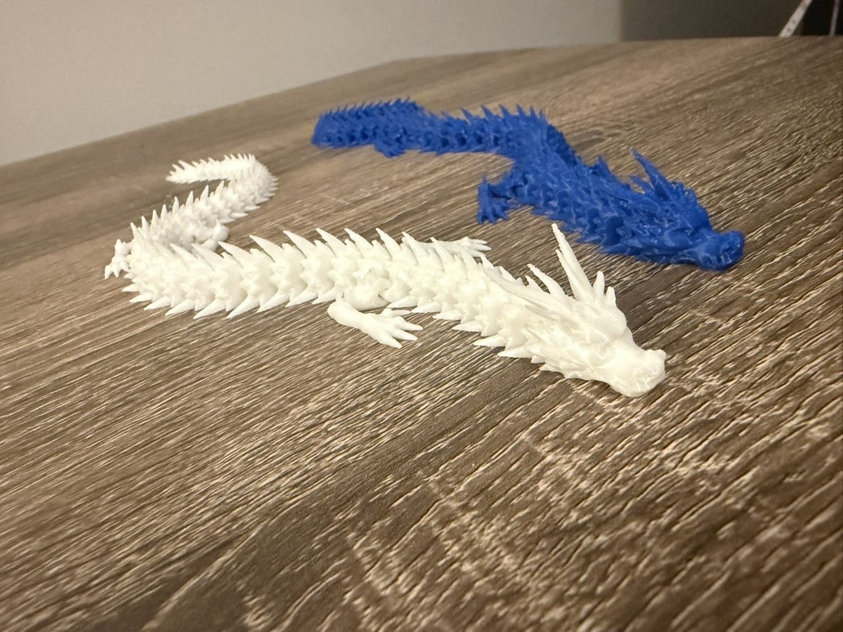 White flexi dragon and blue dragon